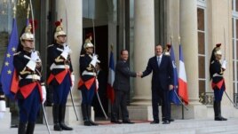 France - President Francois Hollande (L) greets his Azerbaijani counterpart Ilham Aliyev outside the Elysee Palace in Paris, 18Sep2012.