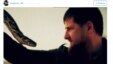 Chechen leader Ramzan Kadyrov (right) grapples with a snake in a screen grab from a video he posted on Instagram.