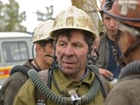 A rescuer working at the gold-mine fire on September 8 (ITAR-TASS)