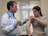 One of the volunteers in the Mechnikov tests receives an injection (epa)