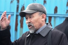 Есенбек Уктешбаев, председатель организации «Оставим народу жилье». Алматы, 13 декабря 2013 года.