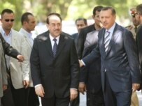 Al-Maliki (center) with Erdogan (right) on Tuesday (AFP)