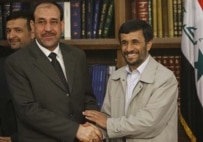 Iraqi Premier Nuri al-Maliki and Iranian President Mahmud Ahmadinejad in Tehran last year