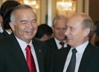 Presidents Karimov (left) and Putin can agree on what constitutes democracy (ITAR-TASS file photo)