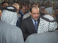 Iraqi Prime Minister Nuri al-Maliki meeting with Shi'ite leaders in Al-Sadr City on November 26 in a bid to quell sectarian violence (epa)