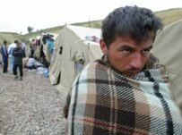An Uzbek refugee from Andijon (epa)