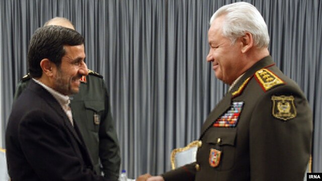 Iranian President Mahmud Ahmadinejad (left) meets with Azerbaijan Defense Minister General Safar Abiyev earlier this week. 