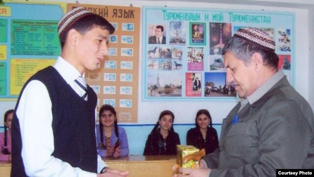RFE/RL contributor Sazak Durdymuradov (right) in the classroom prior to his late-June detention