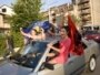Kosovo -- Kosovo Albanians celebrate with flags in the northern part of the divided Kosovo town of Mitrovica, 22Jul2010