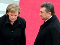 Merkel (left) and Yanukovych in Berlin today (epa)