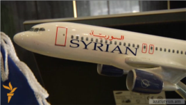 Armenia -- A model of a Syrian Air plane in the airline's office in Yerevan.