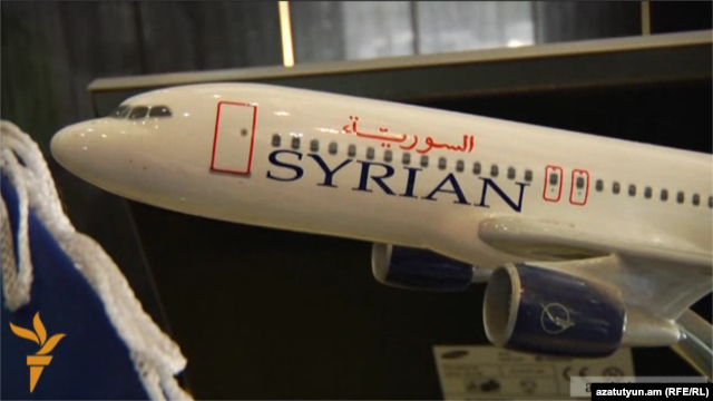 Armenia -- A model of a Syrian Air plane in the airline's office in Yerevan.