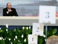 Putin answering questions at today's press conference (TASS)