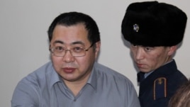 Гражданский активист Ермек Нарымбаев в суде в Алматы. 
