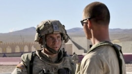 Staff Sergeant Robert Bales (left) is seen at a training center in Fort Irwin, California in an August 2011 photograph.