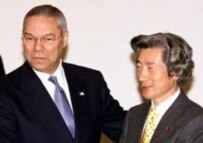 Koizumi (right) is in a delicate position