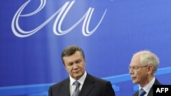European Council President Herman van Rompuy (right) with Ukrainian President Viktor Yanukovych at a joint press conference in Brussels today.