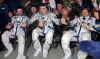 Vittori (left), Sharipov (center), and Chiao after landing safely today