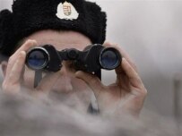 A Hungarian border guard patrols the border with Ukraine ahead of the Schengen expansion (epa)