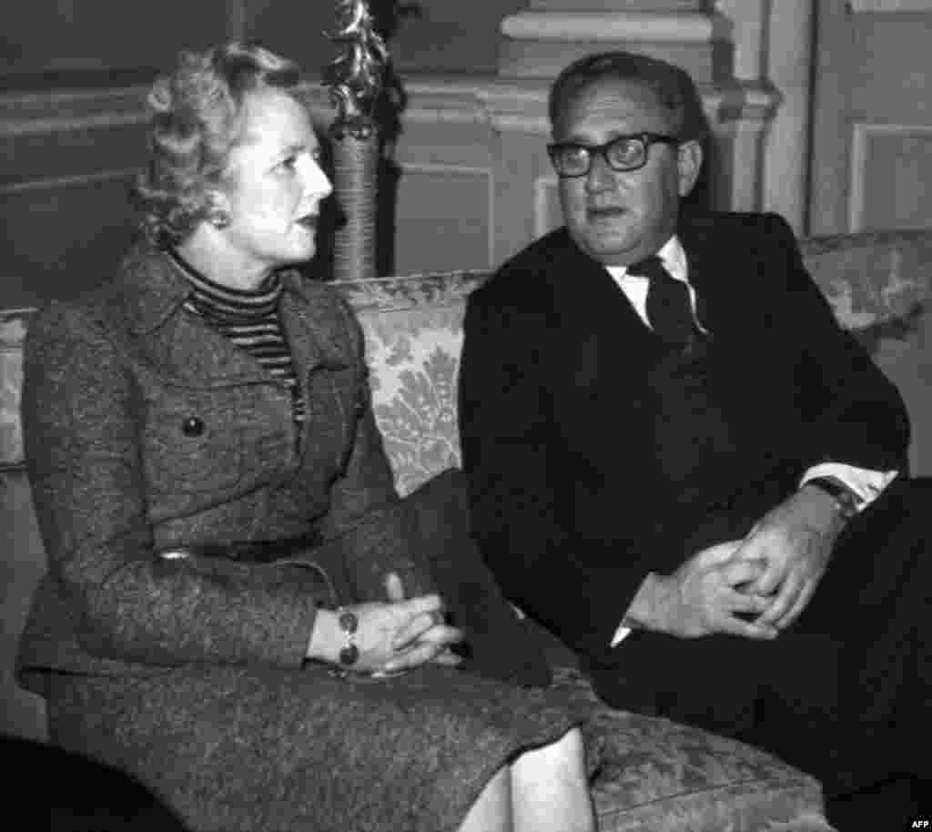 U.S. Secretary of State Henry Kissinger (right) meets with Margaret Thatcher in London in February 1975.