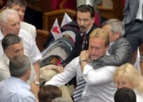 Scuffles broke out in the Verkhovna Rada, the Ukrainian parliment, when the Socialist Party announced on July 11 that it was leaving the 'Orange' coalition to join pro-Russian forces (epa)