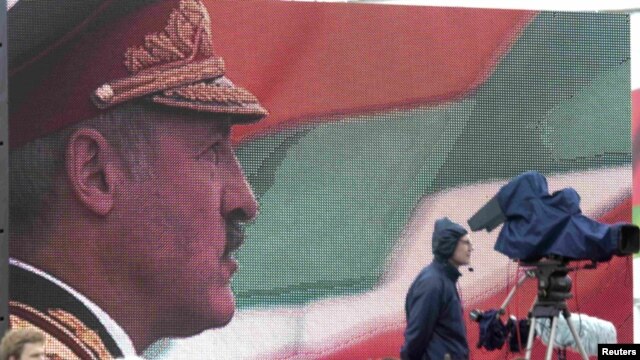 Belarus President Alyaksandr Lukashenka is projected on a large screen as he delivers a speech to mark Independence Day in Minsk on July 3.