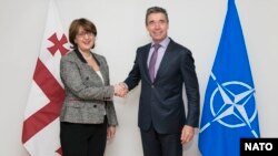Georgian Foreign Minister Maia Panjikidze (left) and NATO Secretary-General Anders Fogh Rasmussen at NATO Headquarters earlier this year.
