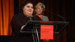 Khadija Ismayilova accepting the 2012 "Courage in Journalism" award from the International Women's Media Foundation in New York in October.