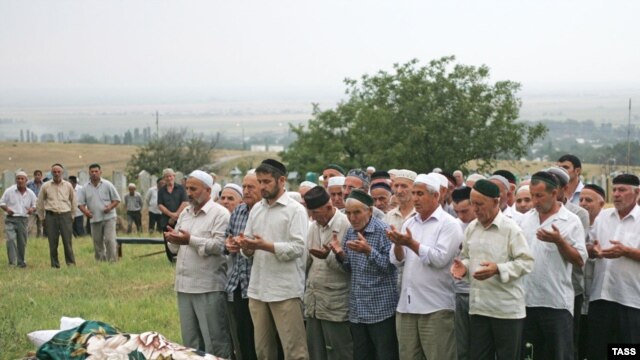 Observers complain Russia's been obstructing the European court's work on Chechnya, where mourners are seen here next to the body of slain rights activist Natalya Estemirova in July 2009, for years.