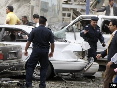 The scene outside the Baghdad governorate building following a bombing on October 25