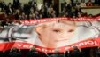 Tymoshenko's supporters unfurled a large banner as Yanukovych spoke.