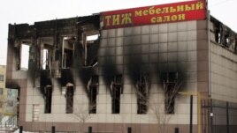 Өртеніп кеткен "Престиж" дүкені. Жаңаөзен, 18 наурыз 2012 жыл.