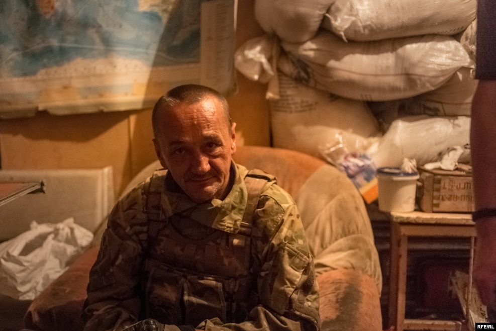 "Prom" is a 51-year-old former Soviet soldier. He spent 10 years in a Soviet prison for stabbing another man, but says he doesn’t regret it. "The Soviet Union was a tough place to live, and I did what I had to do to survive." He says he has no intention of leaving the front line. "They’ll have to take me out in a body bag, because I’m not leaving this place."