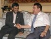 Iranian President Mahmud Ahmadinejad (left) shakes hands with Niyazov prior to bilateral talks in Ashgabat in July (AFP)