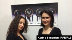 RFE/RL Armenian Service reporters Ruzanna Stepanyan (left) and Lilit Harutyunyan following the award ceremony, held at IWPR's Tbilisi office on December 3, 2012.