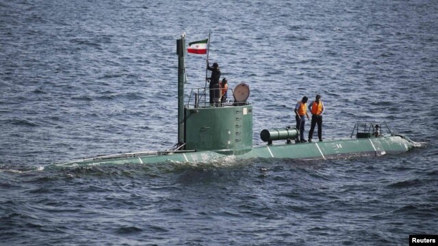 A submarine takes part in the Velayat-90 war games by the Iranian Navy in the Strait of Hormuz in December 2011.