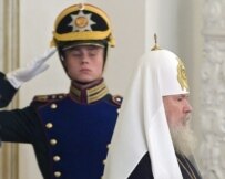 Patriarch Aleksy II entering the Kremlin in June to receive a state award (epa)