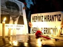 Demonstrators left candles at the site of Hrant Dink's murder in Istanbul, January 19. The placard reads, \