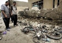 The aftermath of a bomb attack in Baghdad last month