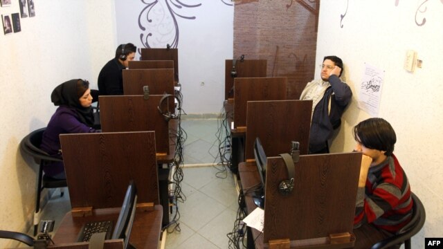 People surf the Internet at a cybercafe in central Tehran. Iran routinely blocks websites deemed immoral or threatening to national security.