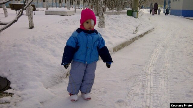 Three-year-old Alina, one of the last children from Russia to be taken in by a U.S. person before a ban on such adoptions took effect on January 1. 