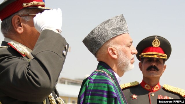 The Afghan parliament has forced the hand of President Hamid Karzai, squeezing out the leadership of the so-called power ministries.