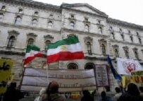 Demonstrators outside the Foreign and Commonwealth Offices in London today urging Britain to refer Iran to the UN Security Council (epa)