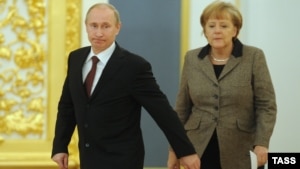 Президент России Владимир Путин и канцлер Германии Ангела Меркель. Москва, 16 ноября 2012 года.