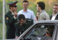 Police and Basij activists check women for proper dress in Tehran on April 22 (Fars)