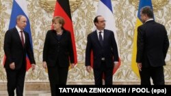 Ресей президенті Владимир Путин, Германия канцлері Ангела Меркель, Франция президенті Франсуа Олланд және Украина президенті Петр Порошенко. Минск, 11 ақпан 2015 жыл.