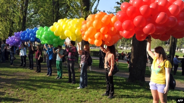 Gay rights activists hold a rally in St. Petersburg earlier this year. 