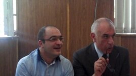 Journalist Eynulla Fatullayev (left) and his lawyer Isakhan Ashurov