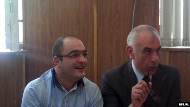 Journalist Eynulla Fatullayev (left) and his lawyer Isakhan Ashurov