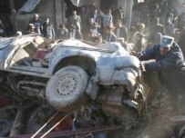 Afghan police work at the scene of today's explosion (epa)